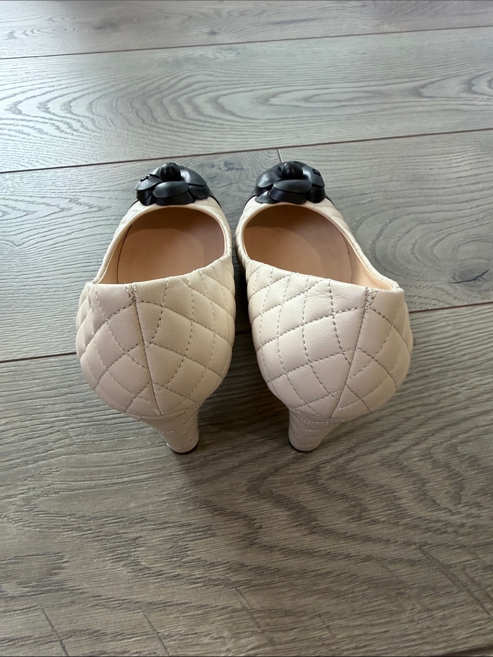 CHANEL Quilted Camellia Cap-Toe Pumps in Cream and Black - Picture 3 of 6